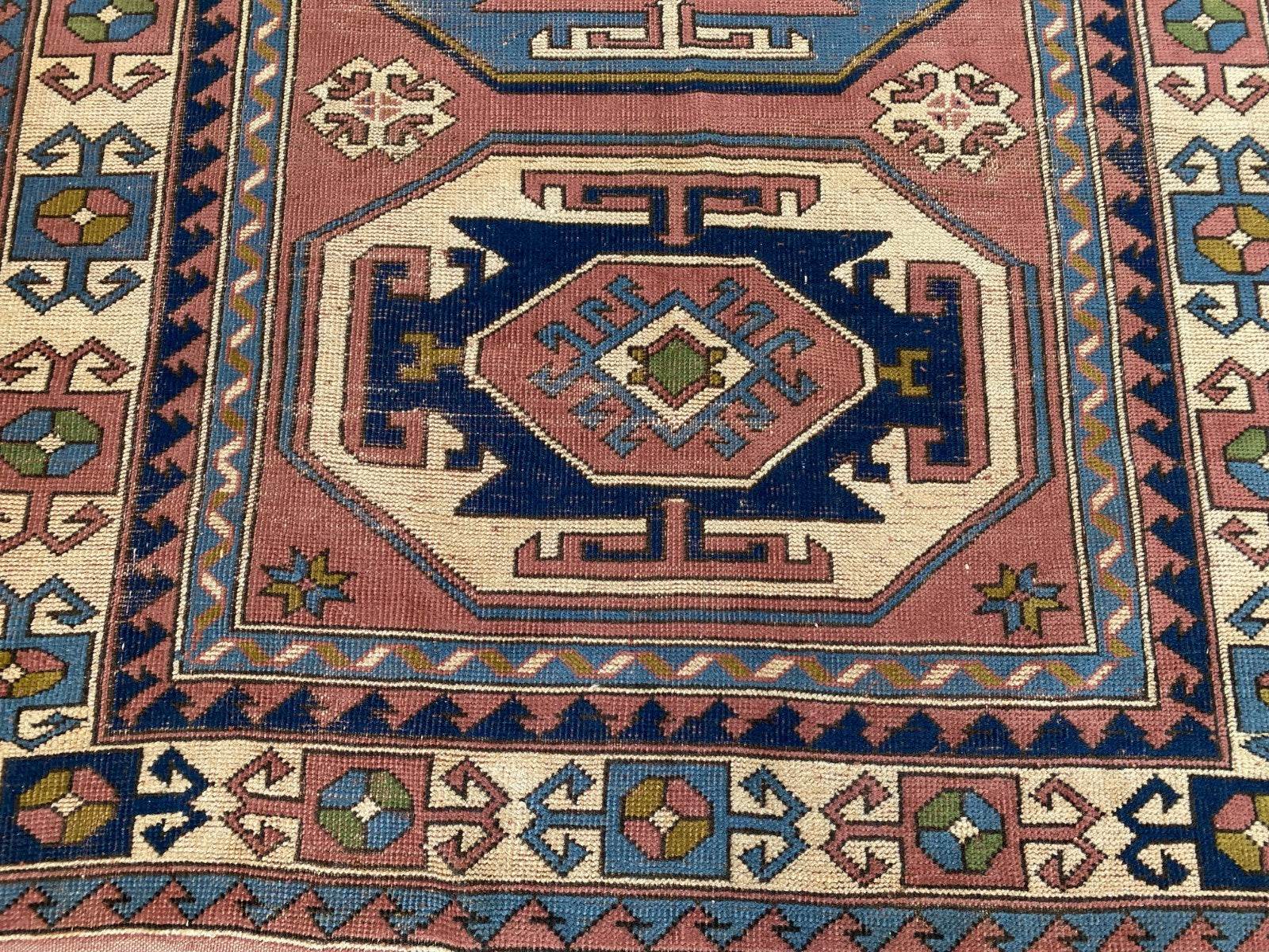 Vintage Turkish Rug | 5.3 x 7.9 ft Hand-Knotted Wool Faded Pastel Anatolian Area