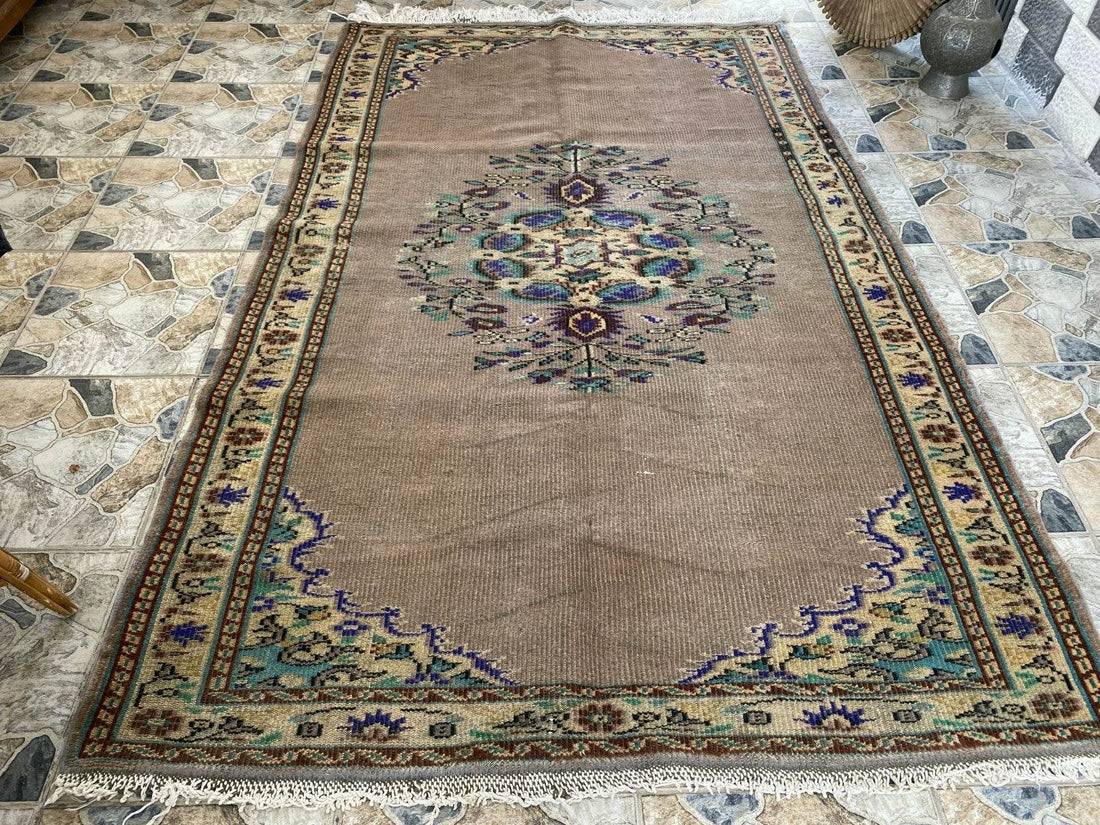 Vintage Turkish Rug | 5.4 x 8.7 ft Hand-Knotted Wool Faded Pastel Anatolian Rug
