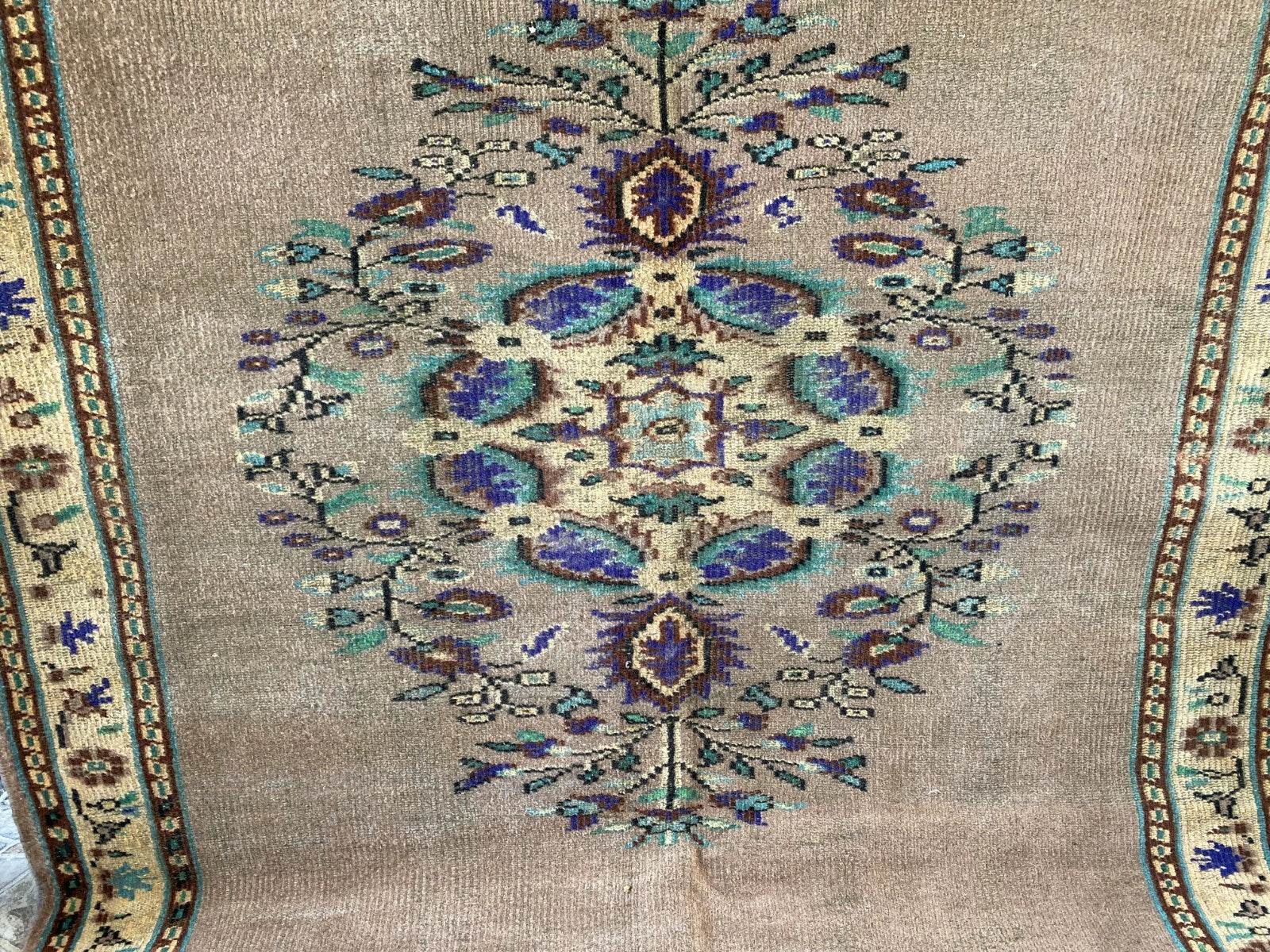 Vintage Turkish Rug | 5.4 x 8.7 ft Hand-Knotted Wool Faded Pastel Anatolian Rug