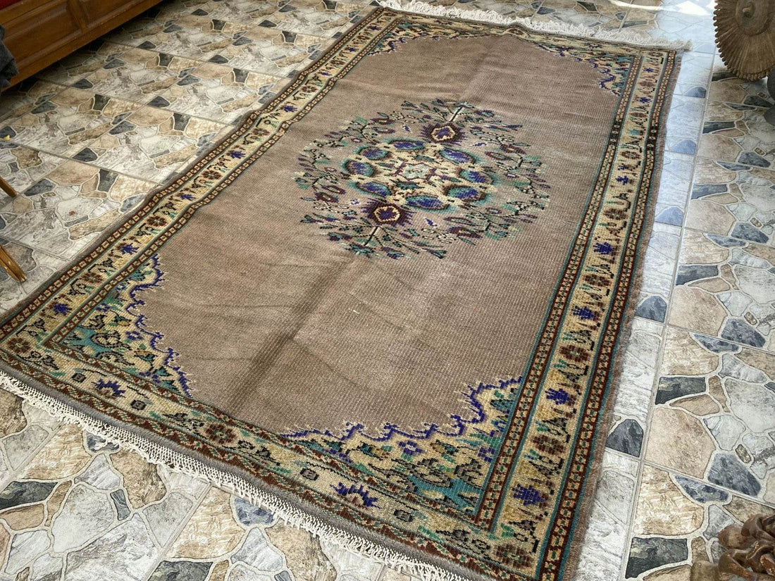 Vintage Turkish Rug | 5.4 x 8.7 ft Hand-Knotted Wool Faded Pastel Anatolian Rug