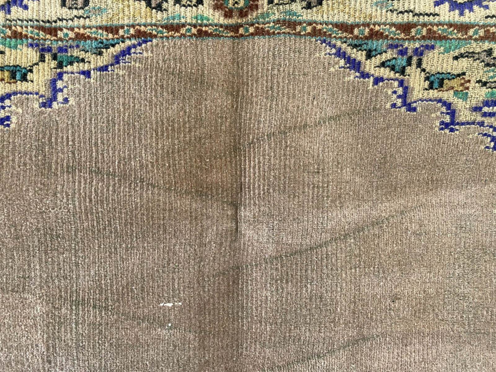 Vintage Turkish Rug | 5.4 x 8.7 ft Hand-Knotted Wool Faded Pastel Anatolian Rug