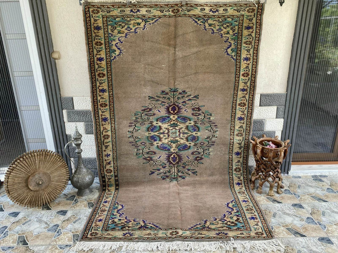 Vintage Turkish Rug | 5.4 x 8.7 ft Hand-Knotted Wool Faded Pastel Anatolian Rug