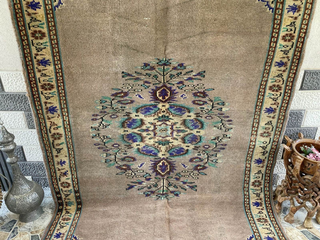 Vintage Turkish Rug | 5.4 x 8.7 ft Hand-Knotted Wool Faded Pastel Anatolian Rug