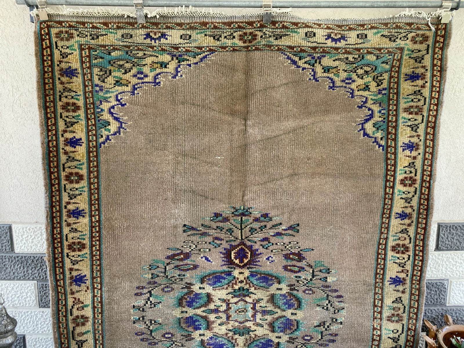 Vintage Turkish Rug | 5.4 x 8.7 ft Hand-Knotted Wool Faded Pastel Anatolian Rug