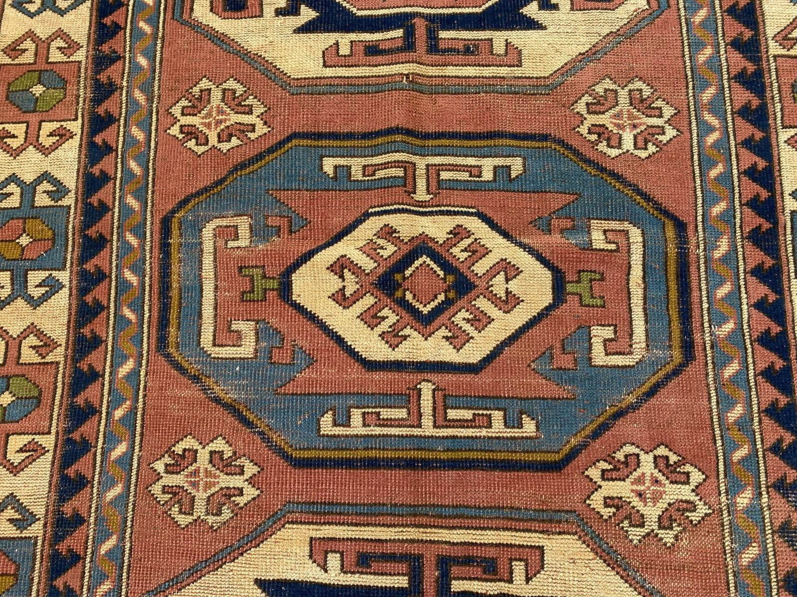 Vintage Turkish Rug | 5.3 x 7.9 ft Hand-Knotted Wool Faded Pastel Anatolian Area