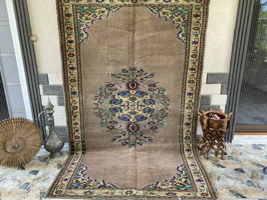 Vintage Turkish Rug | 5.4 x 8.7 ft Hand-Knotted Wool Faded Pastel Anatolian Rug